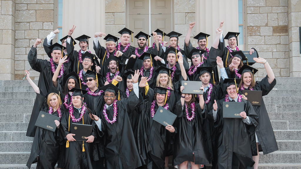 UI REACH graduating class of 2016 cheers on steps of Old Capitol