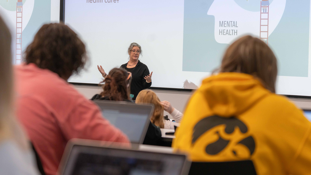 Professor Julie Koch teaches students about mental health 
