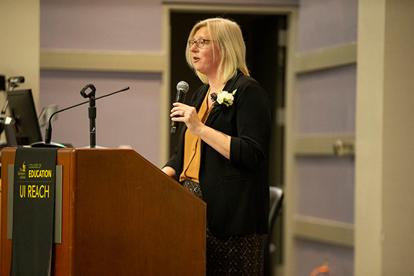 Sara Russell speaking at REACH graduation