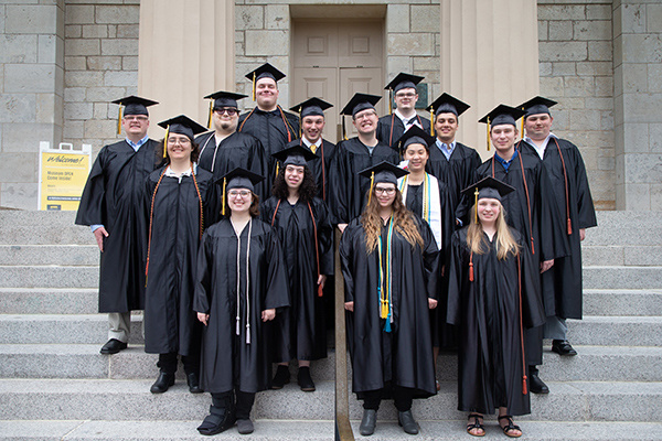 Group of graduates on the pentacrest